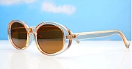 The Freya medium retro oval UV400 sunglasses in translucent or solid colours with super dark lenses