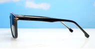 The Canyon unisex round UV400 sunglasses in black with coloured pinstripe, gold accents and dark grey Category 3 lenses