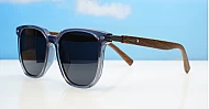 Ari Grey polarised sunglasses with grey frames dark grey lenses and faux wood temples
