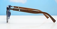 Ari Grey polarised sunglasses with grey frames dark grey lenses and faux wood temples