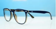 Classic round unisex blue light glasses with silver accents and flexible steel hinges