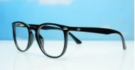 Classic round unisex blue light glasses with silver accents and flexible steel hinges