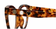 Cat-eye blue light glasses with gold-edged flower and pearl temple detail