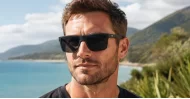 Men's polarised sunglasses with wrap-style frame and ribbed temple detail