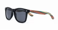 Skate unisex polarised sunglasses with matte black frames and bamboo arms with multi-coloured stripes