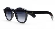 The Gigi round vintage UV400 sunglasses in black with gold arrow detailing and gradient dark grey lenses
