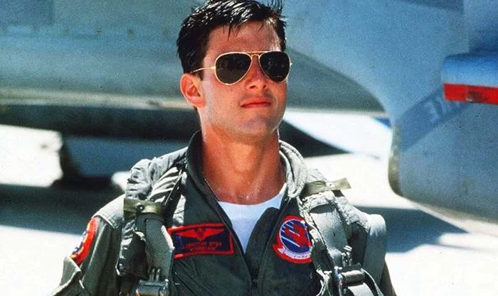 A pilot wearing aviator sunglasses