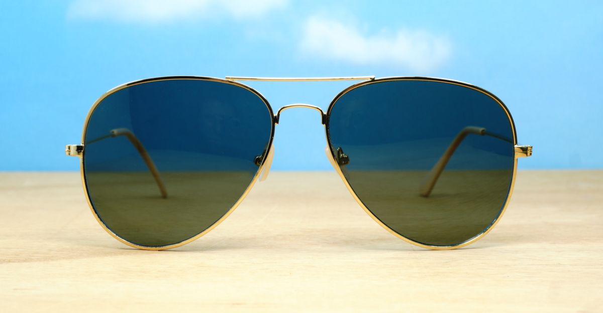 The Superdark Aviator UV400 sunglasses with sleek gold metal frames and dark glass lenses