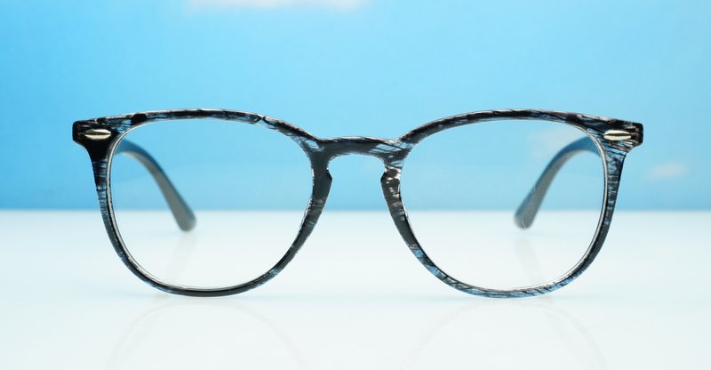 Classic round unisex blue light glasses with silver accents and flexible steel hinges