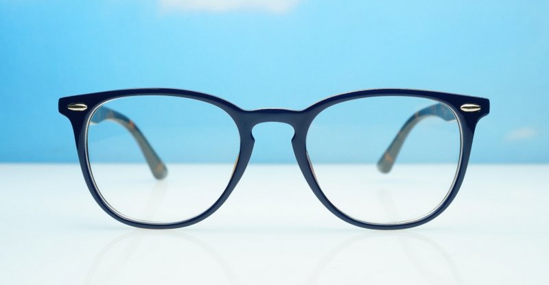 Classic round unisex blue light glasses with silver accents and flexible steel hinges