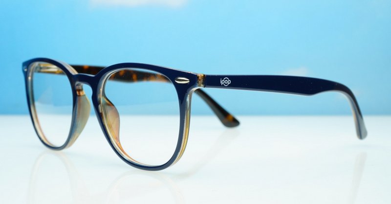Classic round unisex blue light glasses with silver accents and flexible steel hinges