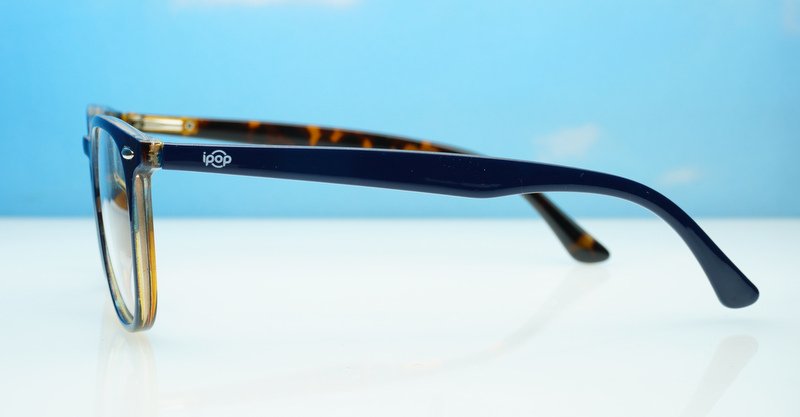 Classic round unisex blue light glasses with silver accents and flexible steel hinges