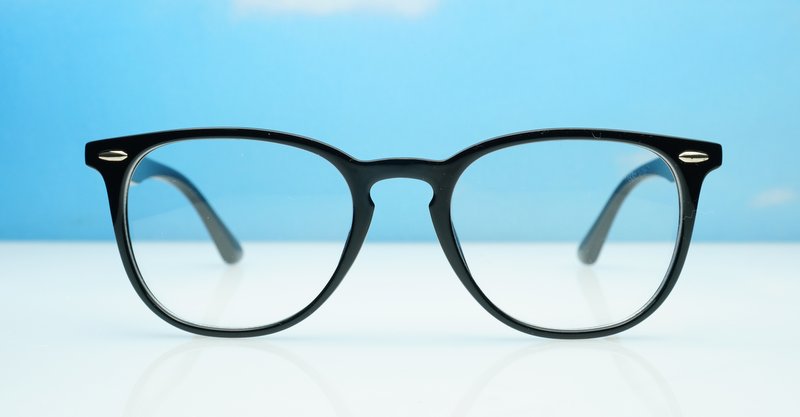 Classic round unisex blue light glasses with silver accents and flexible steel hinges