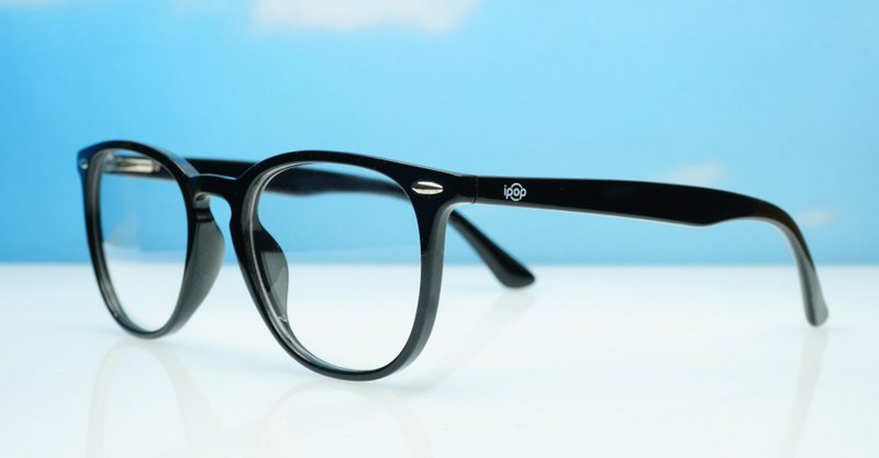 Classic round unisex blue light glasses with silver accents and flexible steel hinges