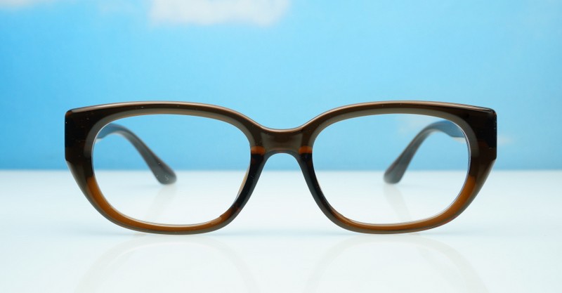 Brown rectangular blue light glasses with clean undetailed frame suited to women