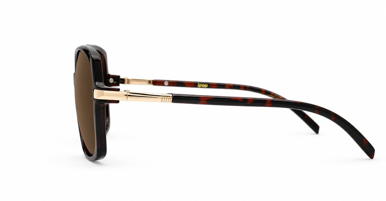 oversized round vintage sunglasses with gold frame detailing and UV400 lenses