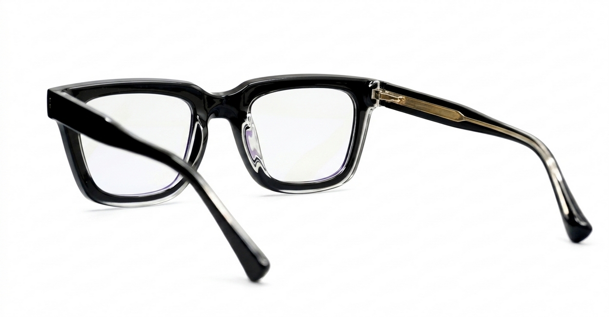 Rectangular blue blocker glasses with black to transparent fade frames and inner core wire temples