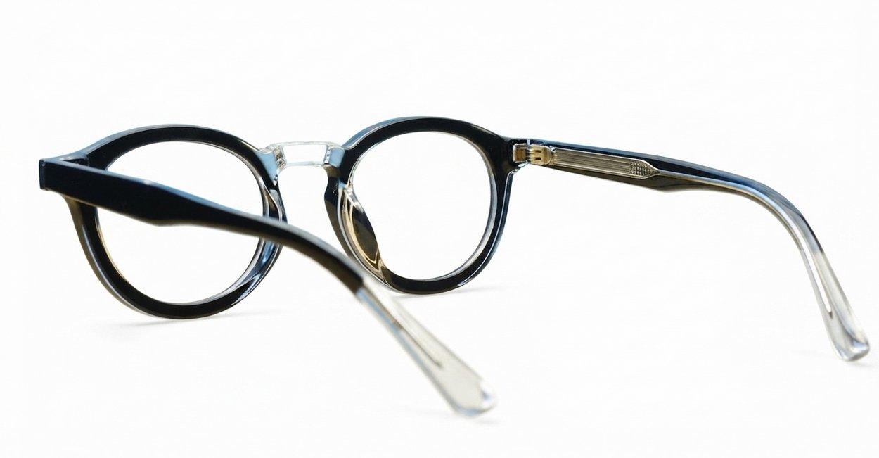 Round black and clear two-tone computer glasses with silver pin temple detailing