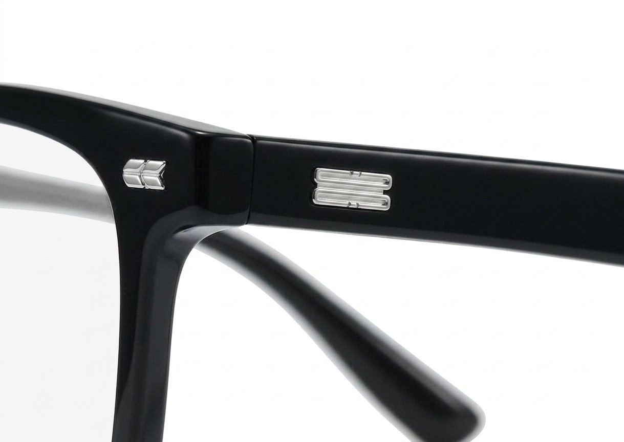 Shiny black square blue block glasses with silver detailing and robust steel hinges