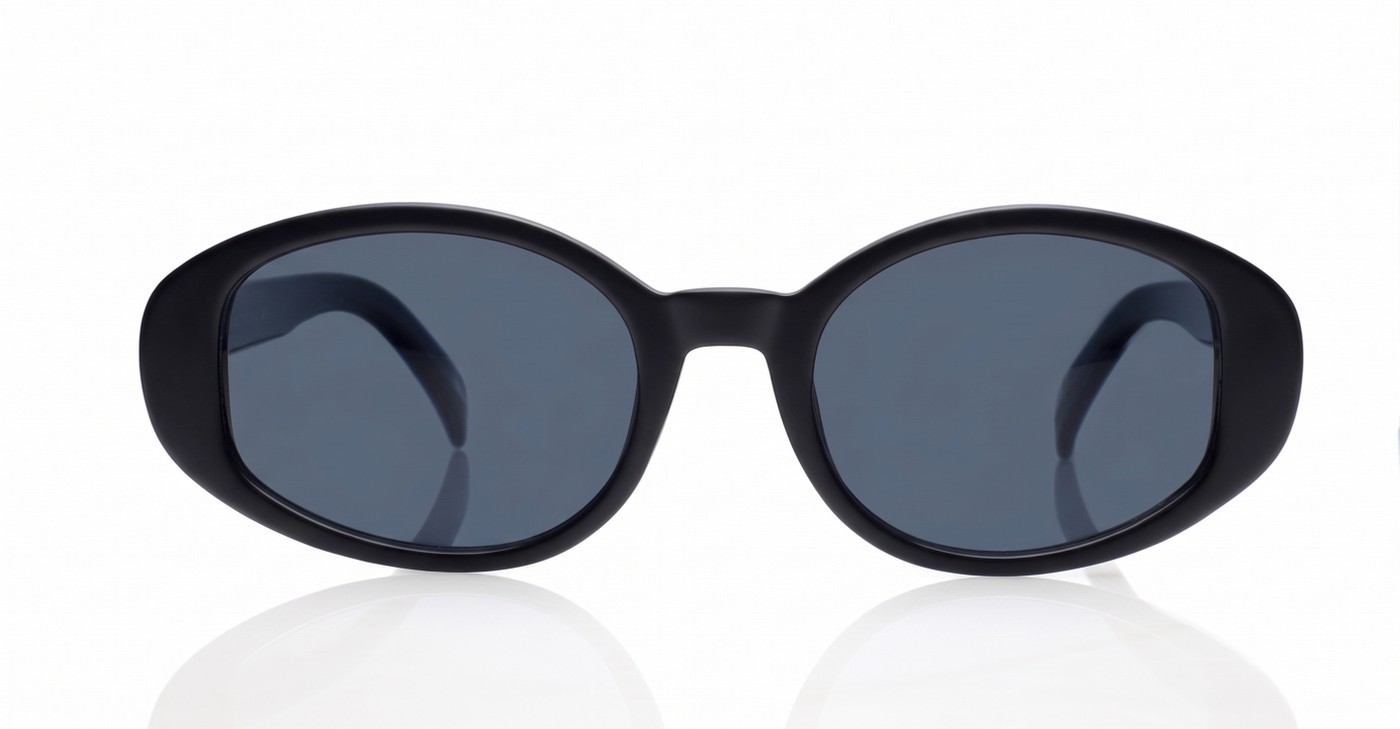 The Freya medium retro oval UV400 sunglasses in translucent or solid colours with super dark lenses